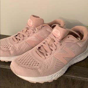 Pink New Balance shoes, so 7, maybe worn once